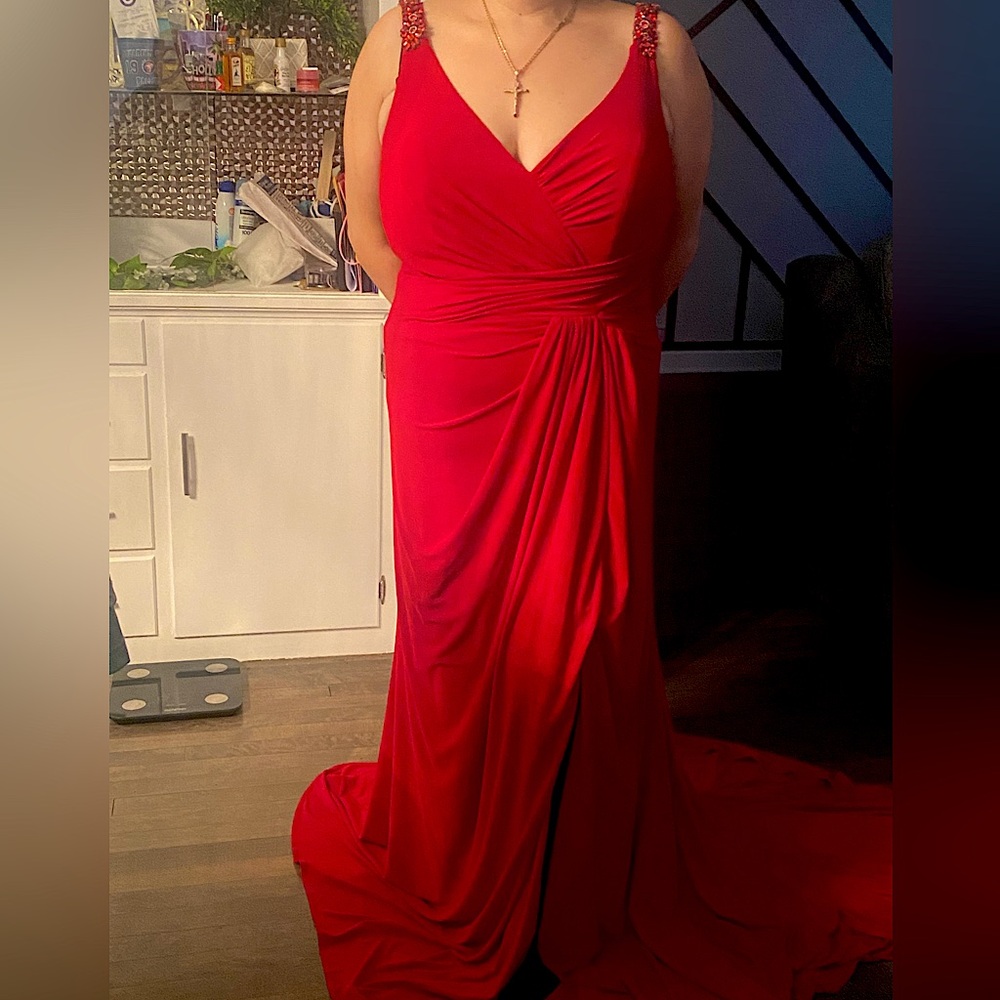 Mac Duggar formal red gown.